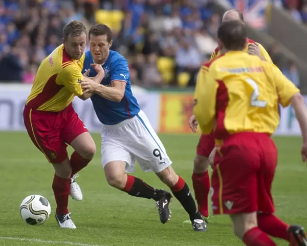 Rangers Jon Daly Fights for Ball in Overpowering 4-0 Ramsdens Cup Victory at Almondvale Stadium