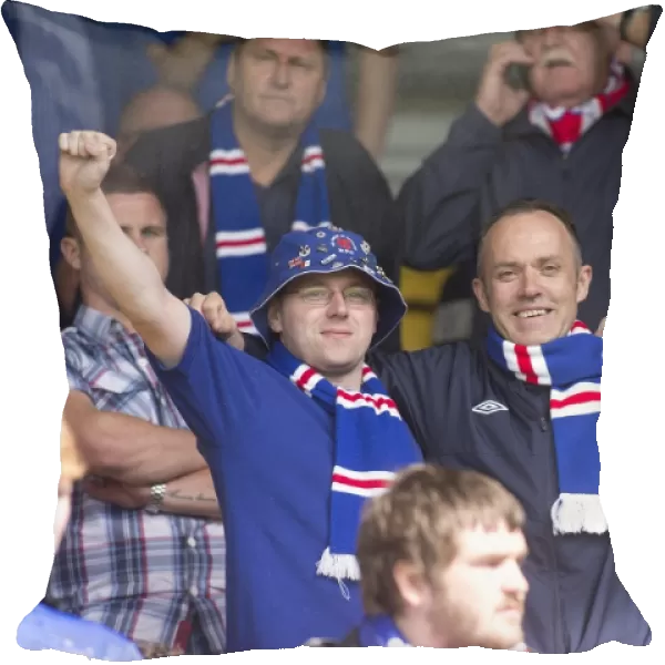 Rangers Triumphant 4-0 Conquest Over Albion Rovers: Jubilant Fans at Almondvale Stadium