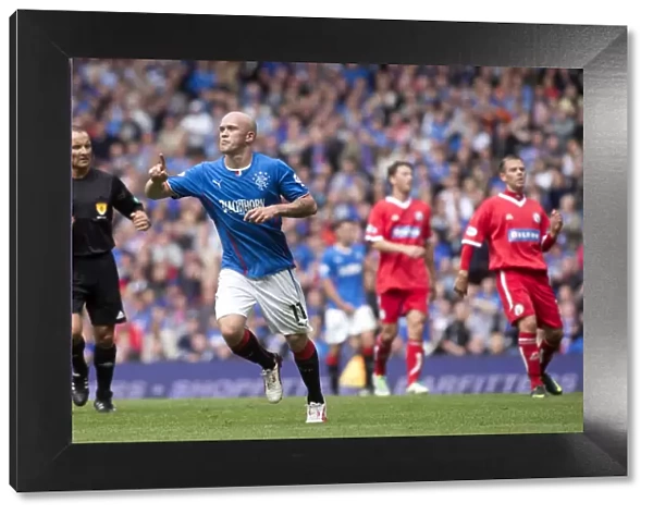 Rangers Nicky Law: Ecstatic Moment as He Celebrates Game-Winning Goal vs. Brechin City in SPFL League 1 at Ibrox Stadium (4-1)