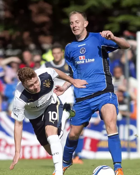 Rangers Macleod Fouls Out Stranraer's Aitken: Red Card in Rangers 3-0 Scottish League One Win