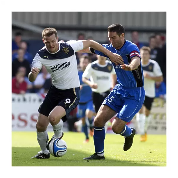 Rangers Jon Daly and Stranraer's Frank McKeown Clash in Scottish League One Match