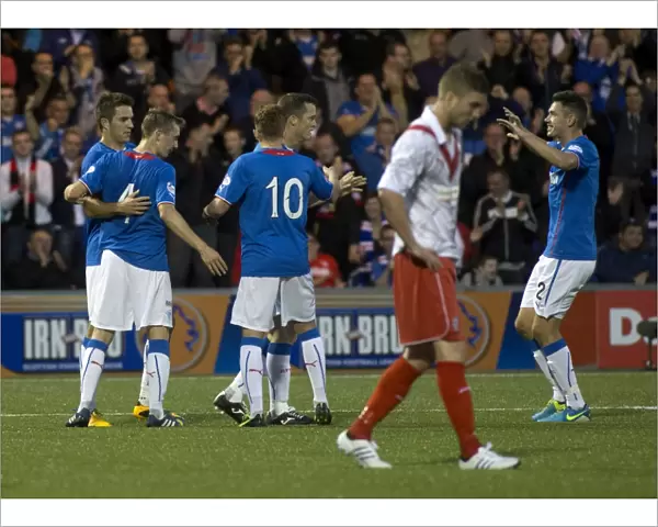 Rangers Six-Goal Blitz: Andy Little and Teammates Celebrate Dominant Win Against Airdrieonians