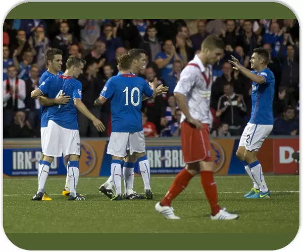 Rangers Six-Goal Blitz: Andy Little and Teammates Celebrate Dominant Win Against Airdrieonians
