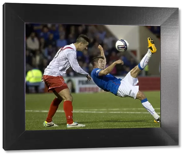 Andy Little's Epic Overhead Kick: Rangers Dominance over Airdrieonians (6-0) in Scottish League One