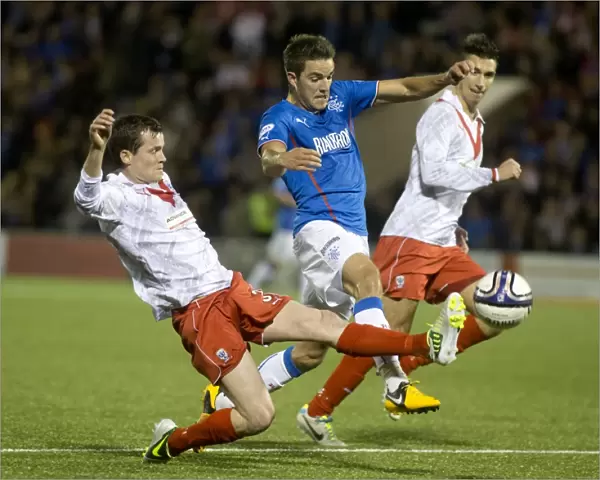 Rangers Dominance: Andy Little vs Paddy Boyle Clash in Rangers 6-0 Scottish League One Victory over Airdrieonians