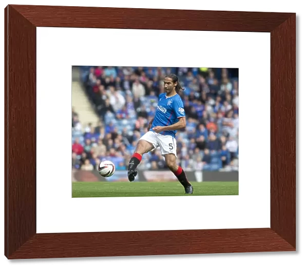 Rangers Bilel Mohsni in the Thick of the Action: 5-1 Victory over Arbroath at Ibrox Stadium