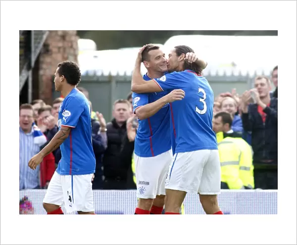 Rangers Mohsni and McCulloch: A Celebratory Moment after Scoring against Ayr United (2-0)