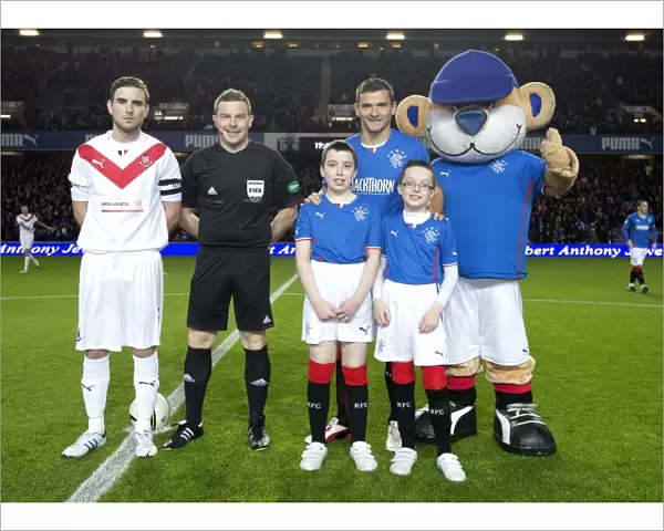 Rangers Football Club: Lee McCulloch and Mascots Celebrate Glory: 3-0 Scottish Cup Victory over Airdrieonians at Ibrox Stadium