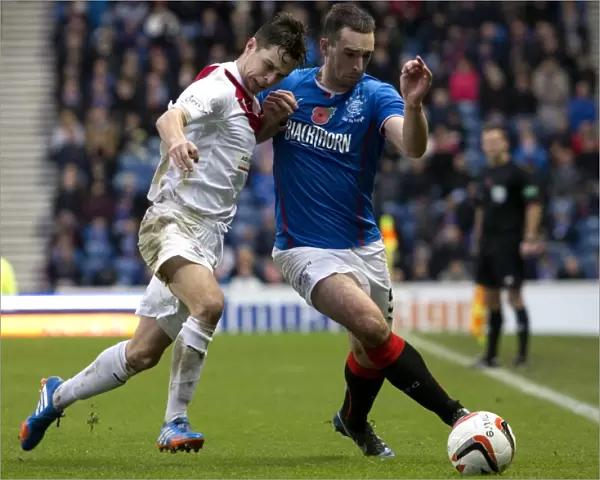 Rangers Lee Wallace Stands Firm Against Airdrieonians Challenge at Ibrox Stadium