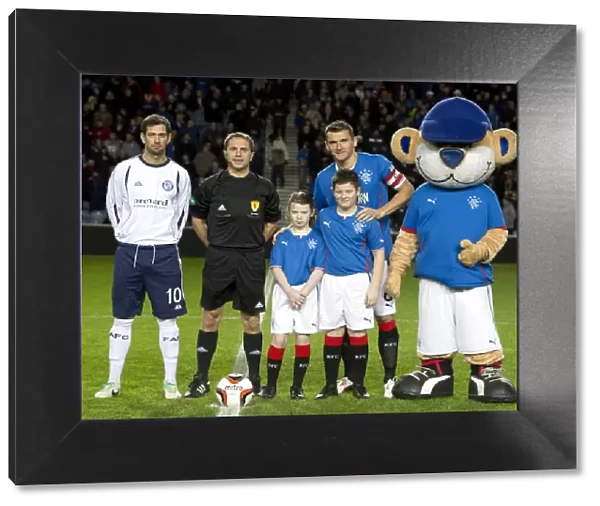 Rangers Football Club: Celebrating Promotion and Scottish Cup Triumph with Captain Lee McCulloch and Mascots at Ibrox Stadium (2003)