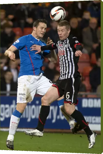 Rangers vs. Dunfermline Athletic: A Scottish League One Showdown - The Clash of Jon Daly and Andy Geggan