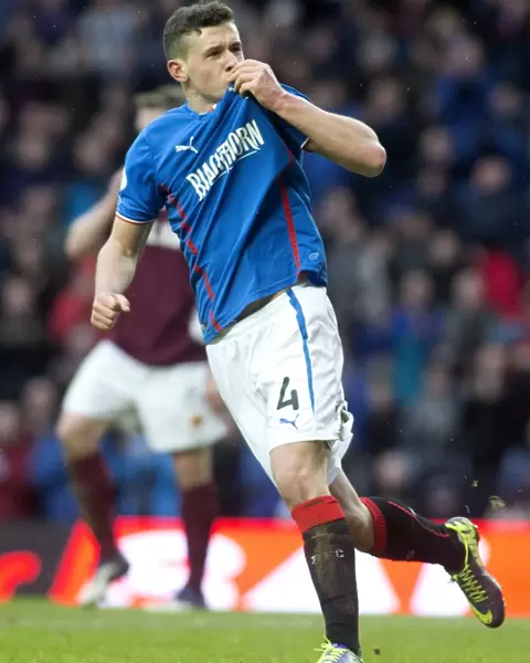 Rangers Fraser Aird: Emotional Goal Celebration with Ibrox Club Badge (Scottish League One)