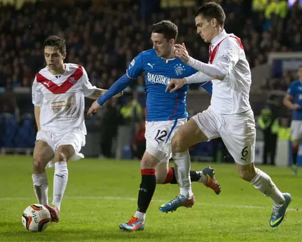 Rangers Nicky Clark Evades Milojevic: A Heart-stopping Moment from Rangers vs Airdrieonians in Scottish League One at Ibrox Stadium