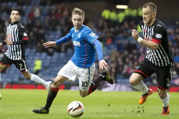 Thrilling Chase: Rangers Robbie Crawford and Dunfermline's Danny Grainger Battle for the Ball at Ibrox Stadium (Scottish Cup Clash, 2003)