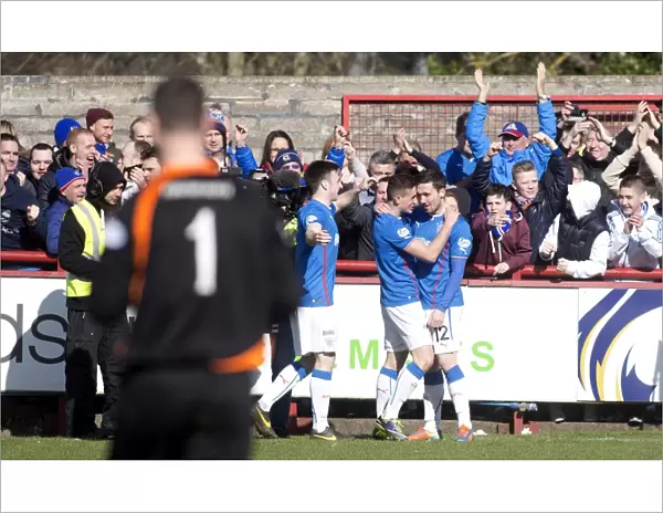 Rangers Nicky Clark Doubles Up: Jubilant Moment with Team Mates in Scottish League One Victory against Brechin City