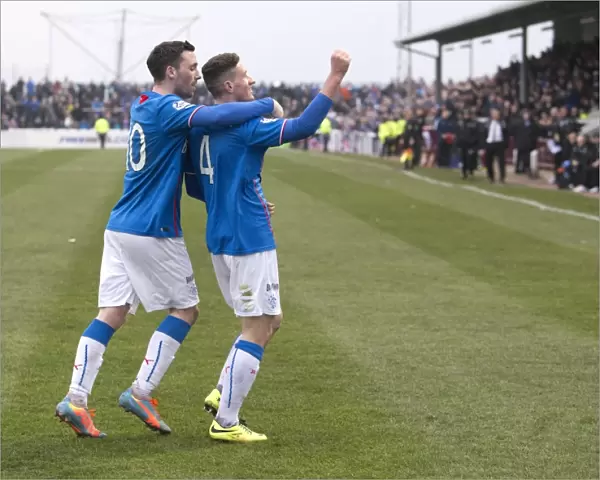 Rangers: Fraser Aird and Nicky Clark's Dramatic Winning Goal Celebration in Scottish League One at Arbroath's Gayfield Park