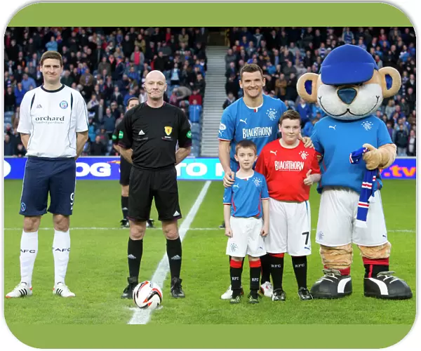 Rangers Football Club: Celebrating Scottish League One Victory and Scottish Cup Triumph with Captain Lee McCulloch and Mascots (2003)