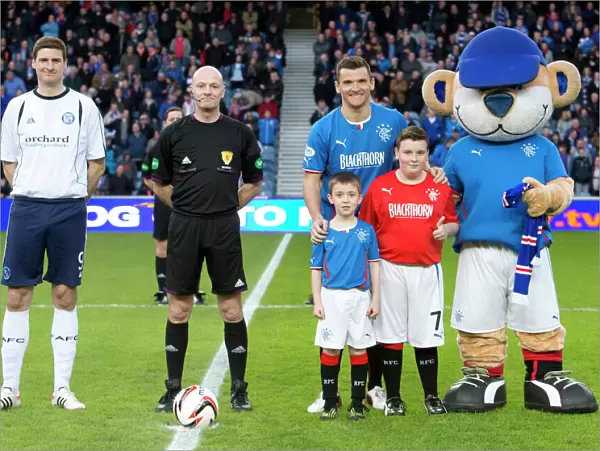 Rangers Football Club: Celebrating Scottish League One Victory and Scottish Cup Triumph with Captain Lee McCulloch and Mascots (2003)