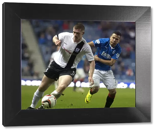 Intense Battle for Supremacy: Rangers vs Ayr United in Scottish League One at Ibrox Stadium
