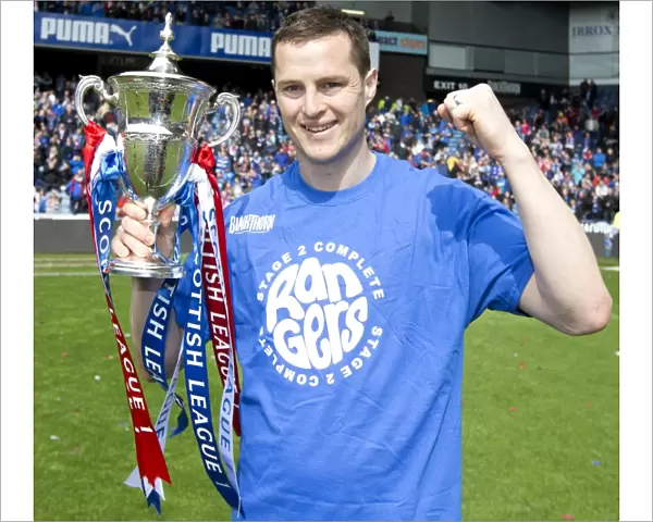 Rangers Football Club: Jon Daly's Triumphant League One Title Celebration with the Scottish Cup at Ibrox Stadium
