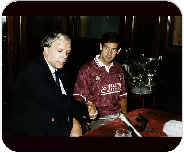New signing Graeme Hogg with Hearts Manager Wallace Mercer at Tynecastle in Edinburgh