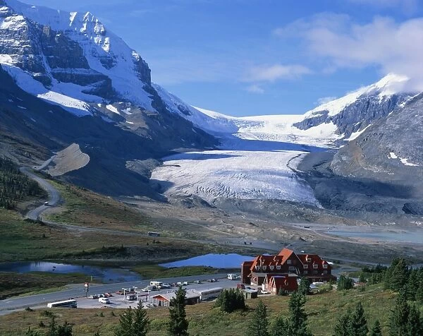 Roadside building dwarfed by the Athabasca Glacier in the Jasper National Park
