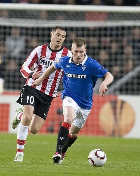 Battle at Philips Stadion: Wylde vs Koevermans - A Scoreless UEFA Europa League Clash between PSV Eindhoven and Rangers