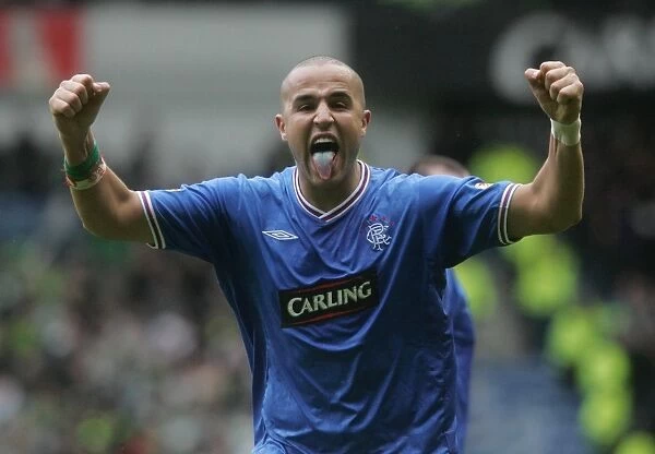 Bougherra's Euphoric Celebration: Rangers 1-0 Victory Over Celtic in the Clydesdale Bank Premier League