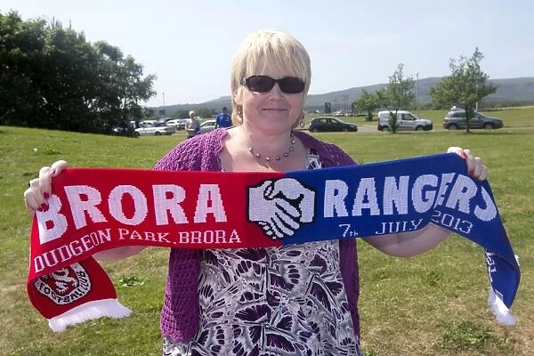 Brora Rangers vs Rangers: Scarf Vendor Amidst the Excitement of a 2-0 Rangers Victory