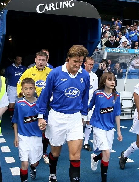 Celebrating Rangers Nine-in-a-Row Anniversary: Rangers Select vs Scottish League Select at Ibrox with Richard Gough as Mascot