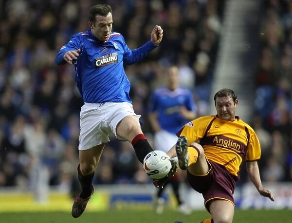 Charlie Adam's Brilliant Performance: Rangers Triumph Over Motherwell (3-1) in the Clydesdale Bank Premier League