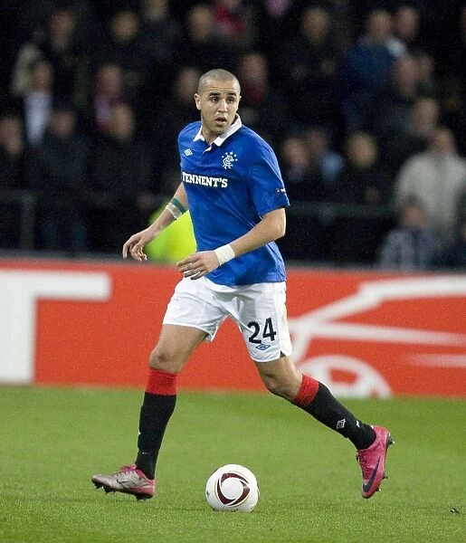 Defiant Bougherra Leads 0-0 Stalemate: Rangers vs PSV Eindhoven in UEFA Europa League Round of 16 First Leg at Philips Stadion