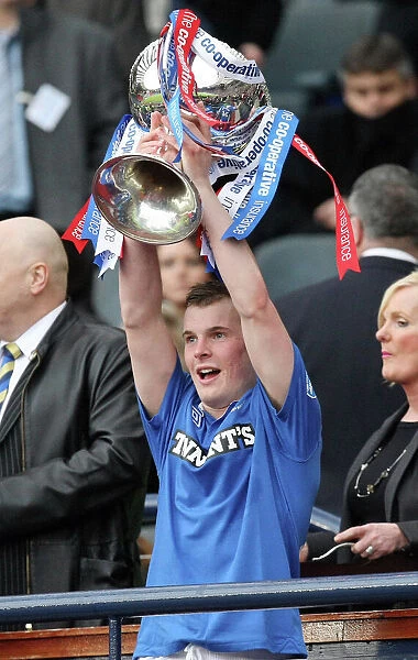 Gregg Wylde Celebrates with the Co-operative Insurance Cup after Rangers Victory over Celtic (2011)