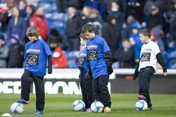 Half Time Rally: Rangers Soccer Schools Motivate Players Amidst 1-0 Deficit vs. Kilmarnock at Ibrox