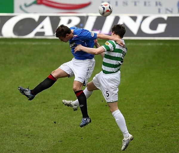 Intense Rivalry: McCulloch vs Caldwell Battle for the Ball in Rangers vs Celtic's 1-0 Ibrox Thriller