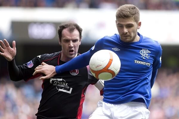 Kyle Hutton Scores the Decisive Goal: Rangers Lead 2-0 Against Clyde at Ibrox Stadium