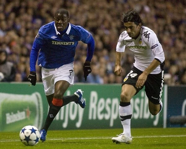 Maurice Edu vs Tino Costa: A Battle in the UEFA Champions League Group C at Ibrox - Rangers 1-1 Valencia