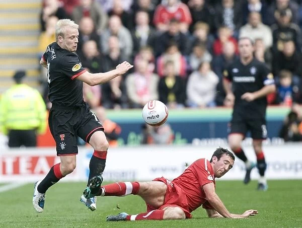 Naismith vs Vernon: A Clash at Pittodrie - Rangers 2-3 Victory