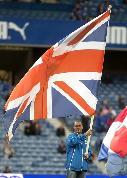 Rangers 2-0 Berwick Rangers: Ramsden Cup Round Two at Ibrox Stadium - Flag Bearer with the Rangers Flag