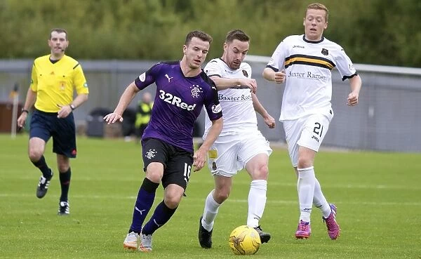 Rangers Andy Halliday in Action at Dumbarton's The Cheaper Insurance Direct Stadium - Ladbrokes Championship Match (Scottish Cup Winner 2003)