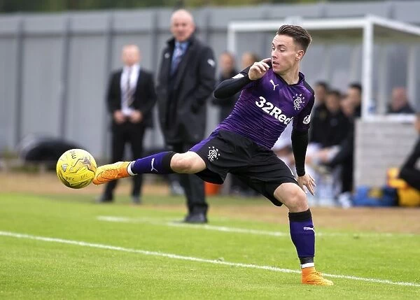 Rangers Barrie McKay in Action: Championship Clash against Dumbarton at The Cheaper Insurance Direct Stadium