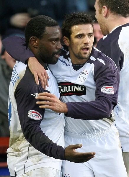 Rangers Darcheville and Novo: Celebrating the Winning Goal Against Inverness Caledonian Thistle in the Clydesdale Bank Premier League