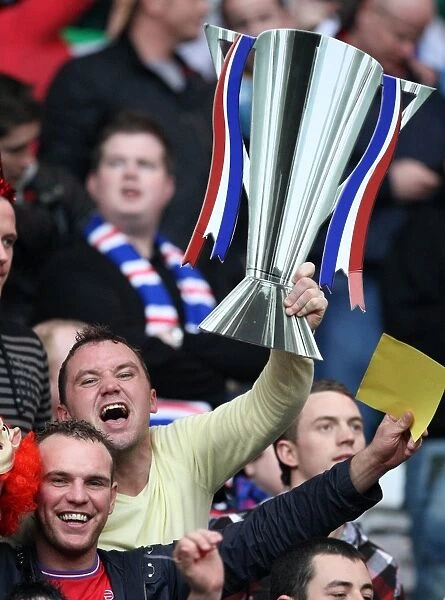 Rangers Fan Triumphs with SPL Trophy at Celtic Park: Celtic 2-1 Rangers