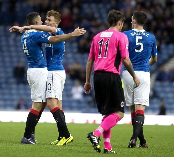 Rangers FC: Macleod and Aird Celebrate First Goal in Petrofac Training Cup at Ibrox Stadium