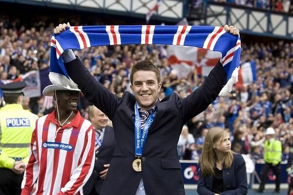 Rangers Football Club: Andrew Little's Triumphant Moment - Celebrating the SPL Championship Win (2010-11) at Ibrox Stadium