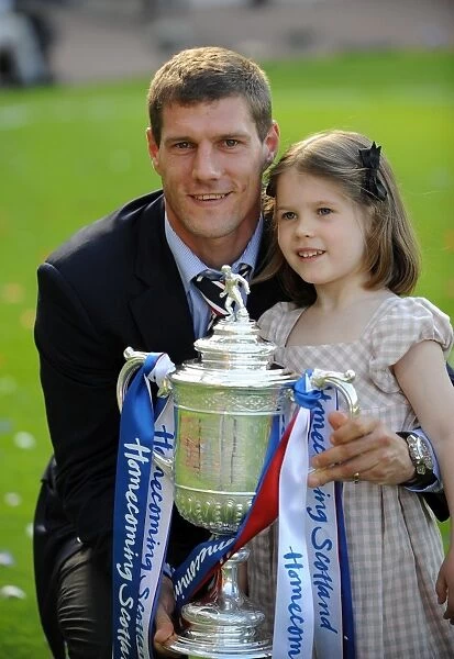 Rangers Football Club: Andrius Velicka and Daughter Rejoice in Homecoming Scottish Cup Victory (2009)