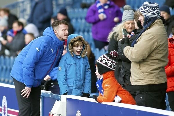 Rangers Football Club: Andy Halliday Greets Ecstatic Fans at Ibrox Stadium during Rangers vs Falkirk in Ladbrokes Championship