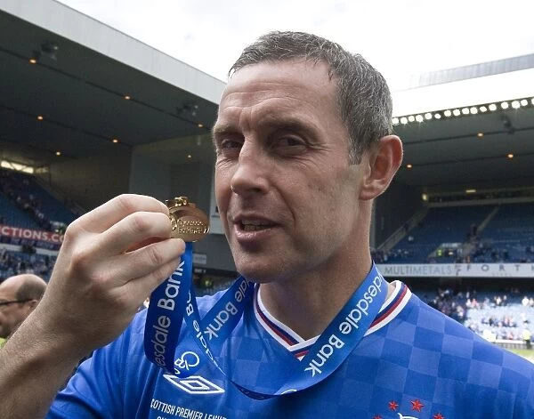 Rangers Football Club: David Weir's Glory with the Scottish Premier League Champion Medal at Ibrox Stadium