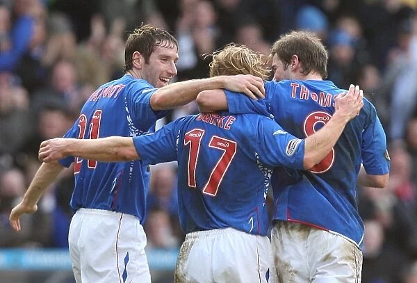 Rangers Football Club: Kirk Broadfoot, Kevin Thompson, and Chris Burke Celebrate First Goal in Scottish Cup Fifth Round Replay vs Hibernian at Ibrox