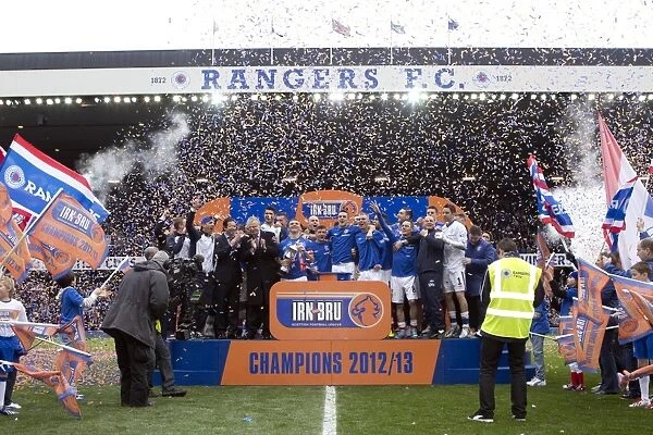 Rangers Football Club: Lee McCulloch Celebrates Promotion to Third Division with Irn Bru Trophy Lift at Ibrox Stadium